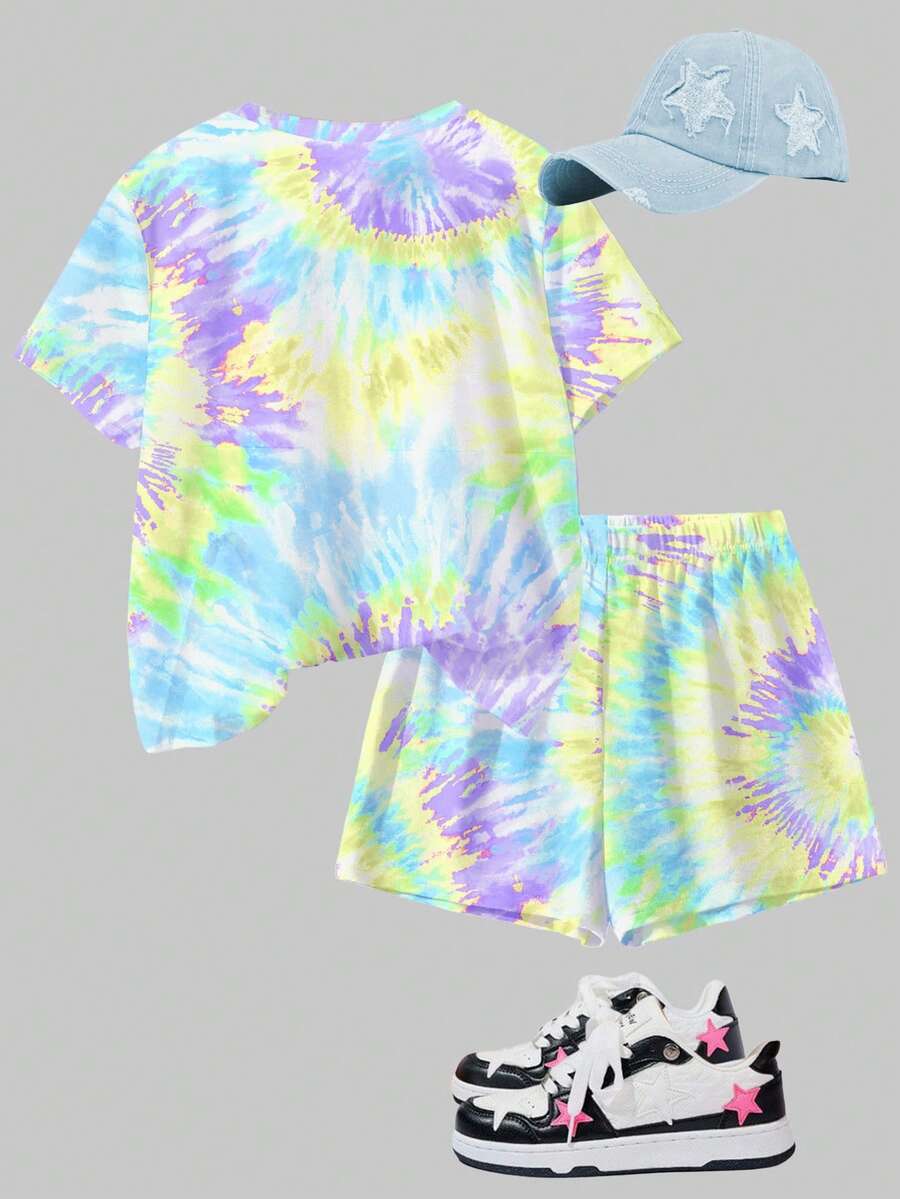 Tween girls multicolor tie-dye 2-piece outfit set featuring a drop-shoulder short-sleeve t-shirt and matching loose track shorts with side pockets.
