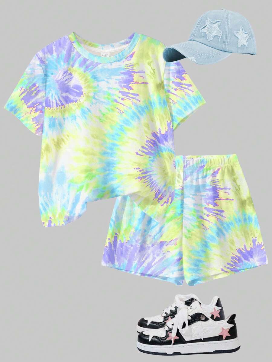 Tween girls multicolor tie-dye 2-piece outfit set featuring a drop-shoulder short-sleeve t-shirt and matching loose track shorts with side pockets.