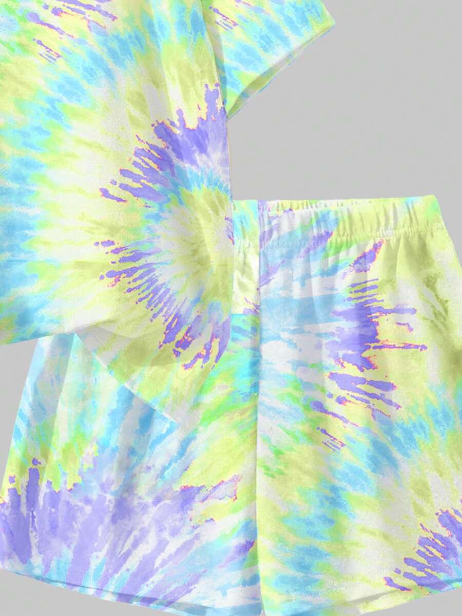 Tween girls multicolor tie-dye 2-piece outfit set featuring a drop-shoulder short-sleeve t-shirt and matching loose track shorts with side pockets.