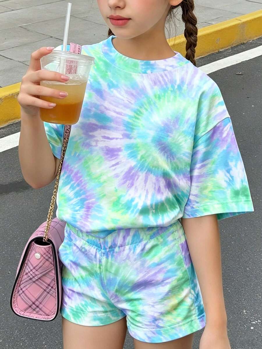 Tween girls multicolor tie-dye 2-piece outfit set featuring a drop-shoulder short-sleeve t-shirt and matching loose track shorts with side pockets.