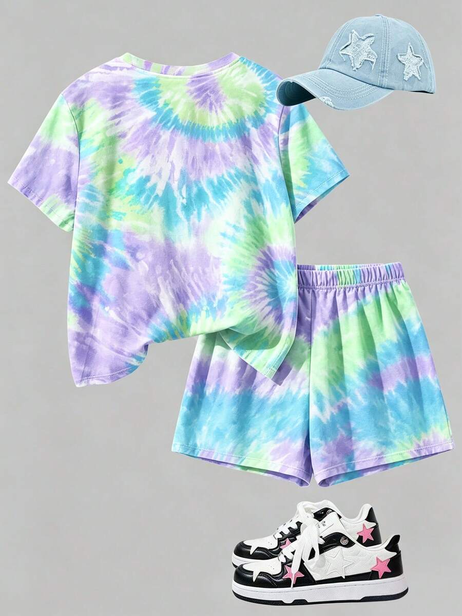 Tween girls multicolor tie-dye 2-piece outfit set featuring a drop-shoulder short-sleeve t-shirt and matching loose track shorts with side pockets.