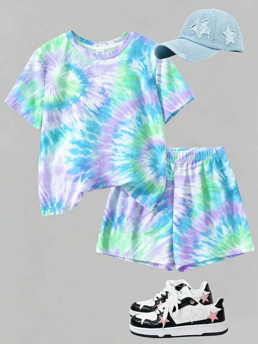 Tween girls multicolor tie-dye 2-piece outfit set featuring a drop-shoulder short-sleeve t-shirt and matching loose track shorts with side pockets.