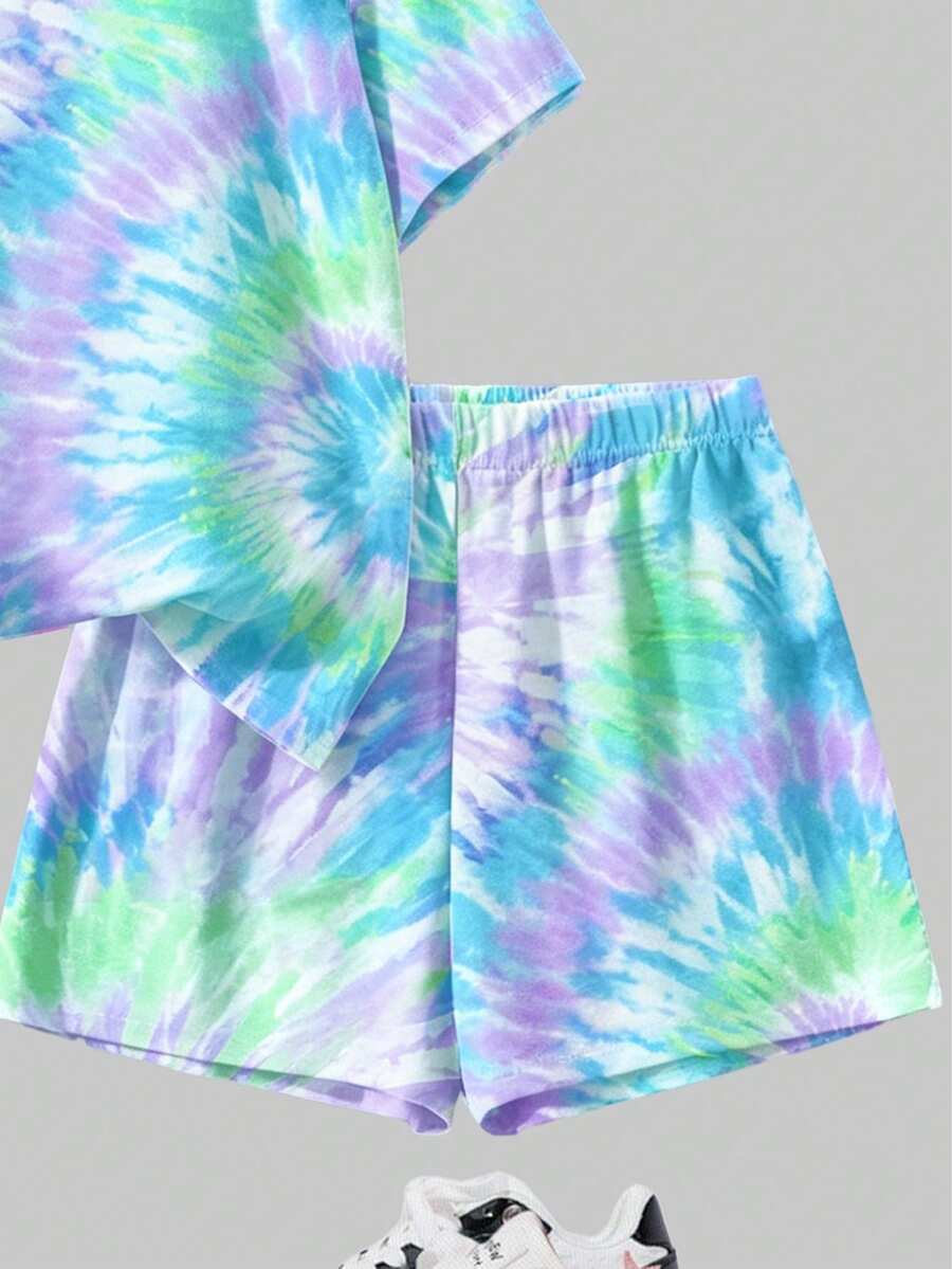 Tween girls multicolor tie-dye 2-piece outfit set featuring a drop-shoulder short-sleeve t-shirt and matching loose track shorts with side pockets.