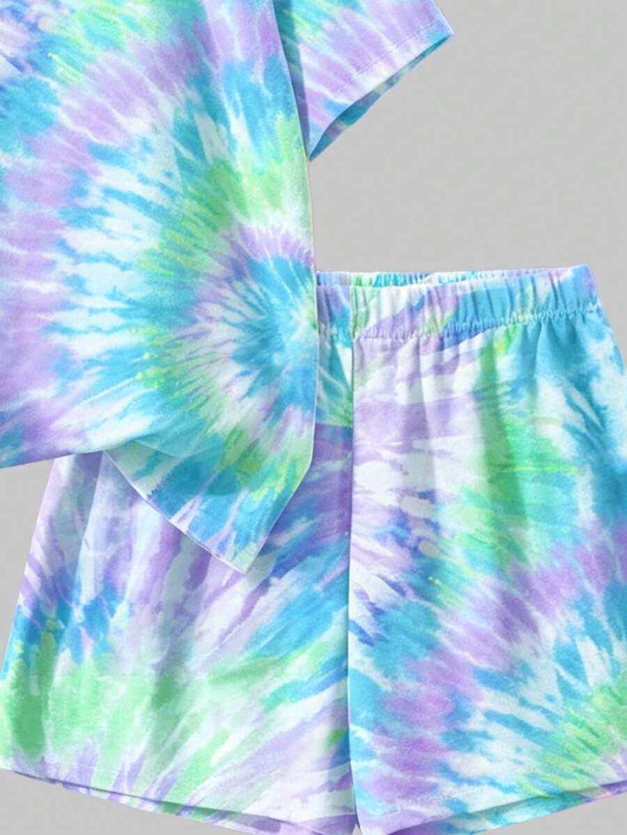 Tween girls multicolor tie-dye 2-piece outfit set featuring a drop-shoulder short-sleeve t-shirt and matching loose track shorts with side pockets.