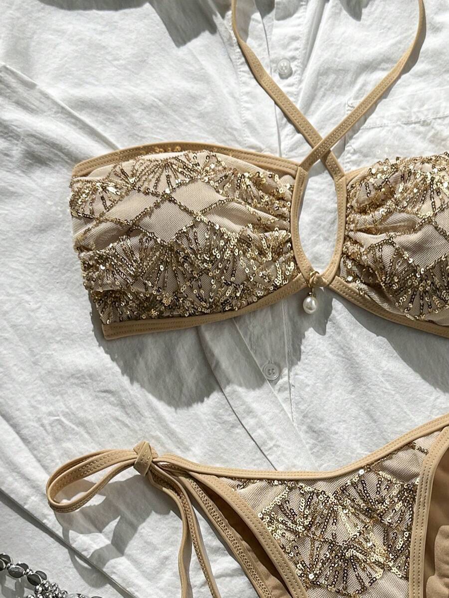 Black 2-piece snakeskin textured halter bikini set for women featuring high waist tie side bottoms and triangle cups.