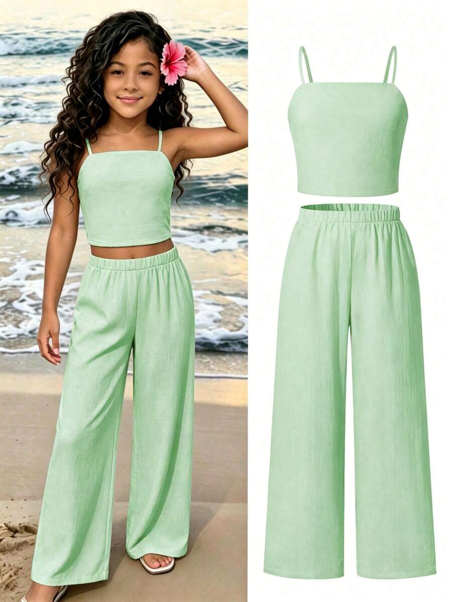 Tween girls casual 2-piece set featuring an apricot woven camisole crop top with back shirring and matching high-waisted loose long pants.