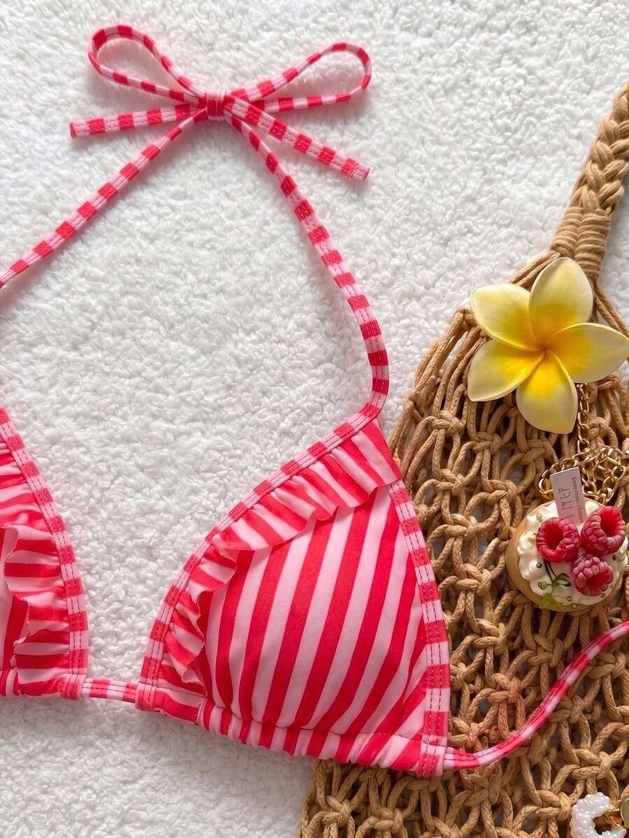 Women's ruffled halter two-piece bikini set with low waist bottoms and wireless triangle cups.
