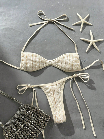 Apricot 2-piece sequin textured halter bikini set featuring a wireless top with lace-up backless ties and matching low-waist side-tie thong bottoms.