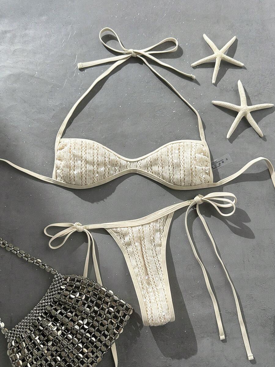 Apricot 2-piece sequin textured halter bikini set featuring a wireless top with lace-up backless ties and matching low-waist side-tie thong bottoms.