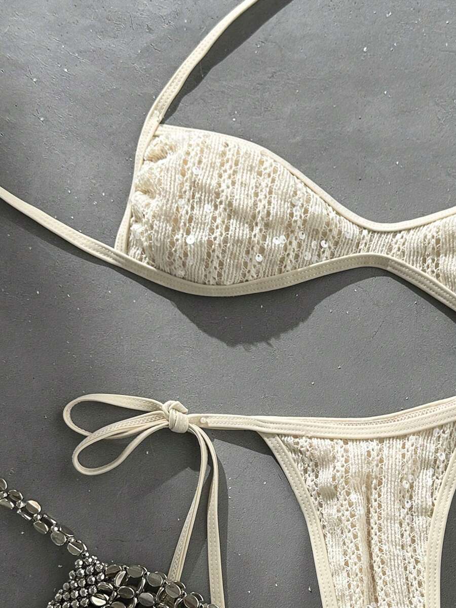 Apricot 2-piece sequin textured halter bikini set featuring a wireless top with lace-up backless ties and matching low-waist side-tie thong bottoms.