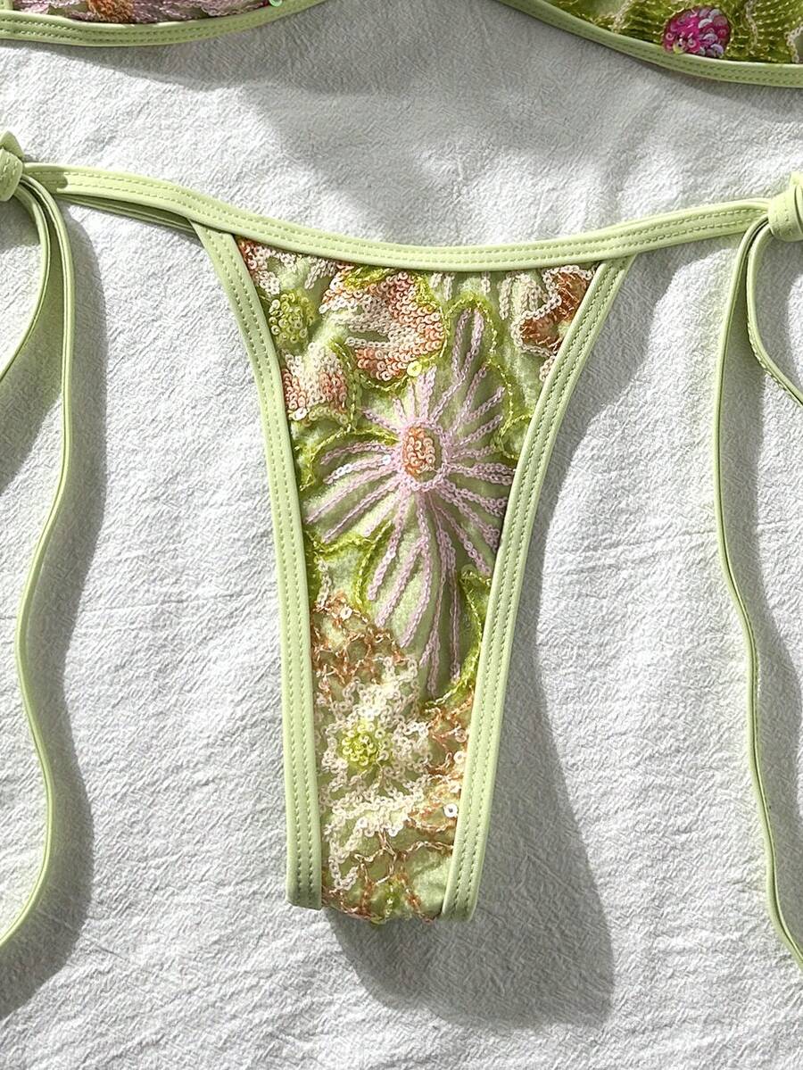 Apricot 2-piece sequin textured halter bikini set featuring a wireless top with lace-up backless ties and matching low-waist side-tie thong bottoms.