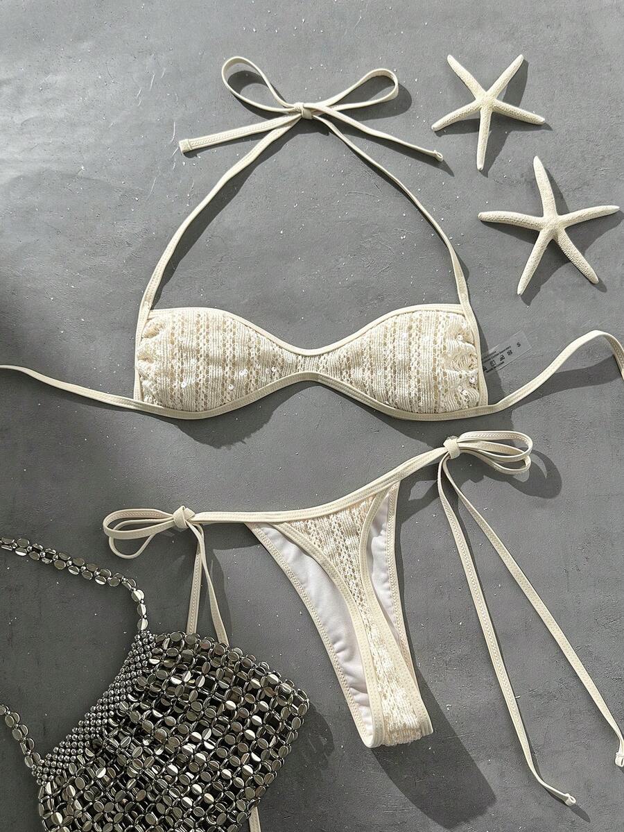 Apricot 2-piece sequin textured halter bikini set featuring a wireless top with lace-up backless ties and matching low-waist side-tie thong bottoms.
