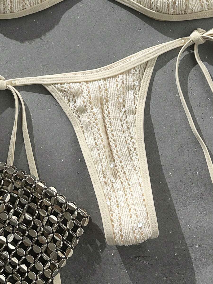 Apricot 2-piece sequin textured halter bikini set featuring a wireless top with lace-up backless ties and matching low-waist side-tie thong bottoms.