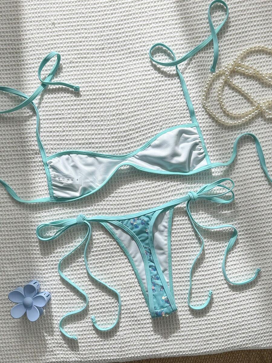 Apricot 2-piece sequin textured halter bikini set featuring a wireless top with lace-up backless ties and matching low-waist side-tie thong bottoms.
