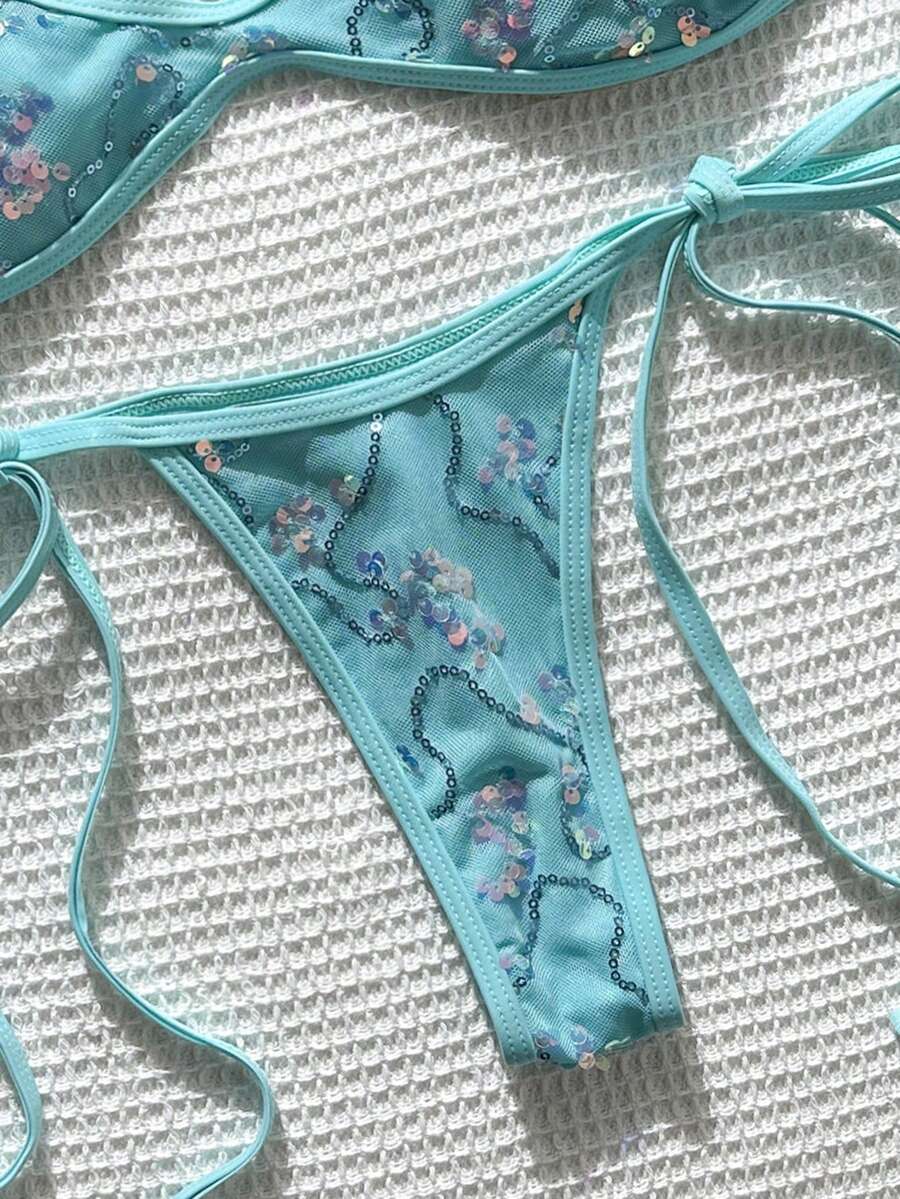 Apricot 2-piece sequin textured halter bikini set featuring a wireless top with lace-up backless ties and matching low-waist side-tie thong bottoms.