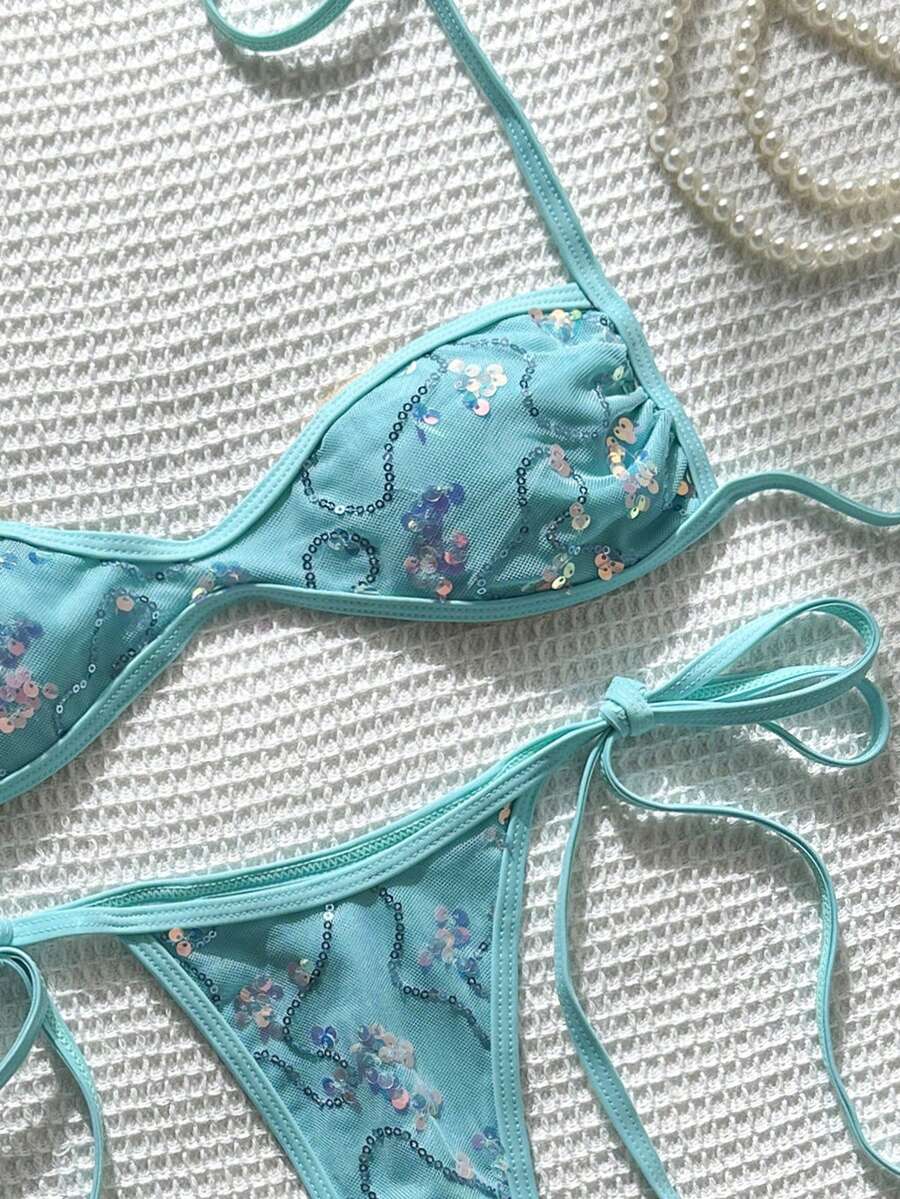 Apricot 2-piece sequin textured halter bikini set featuring a wireless top with lace-up backless ties and matching low-waist side-tie thong bottoms.