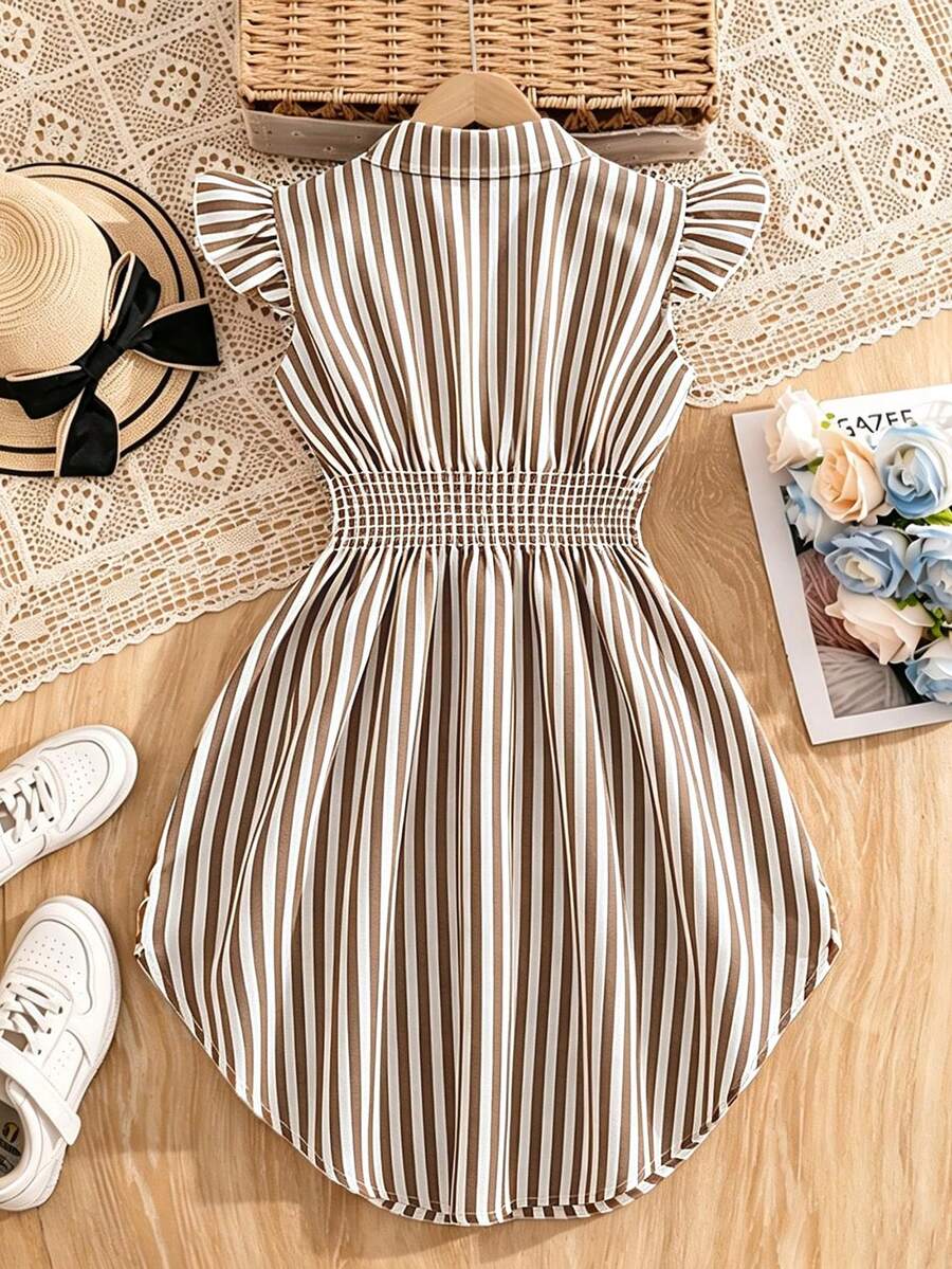 Tween girls blue and white striped casual shirt dress featuring a collared neckline, button front, and flounce sleeves by Left Mama.