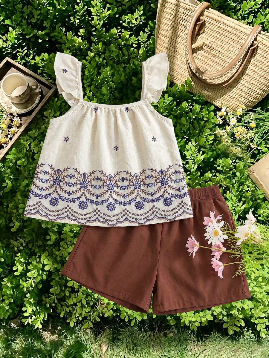 Tween girls 2-piece bohemian outfit set in apricot featuring a square neck embroidered sleeveless camisole top and matching floral wide leg shorts.