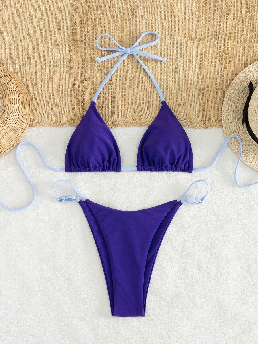 Women's printed halter neck tie two-piece swimwear featuring a wireless triangle top with removable padding and high-waist high-cut bikini bottoms.