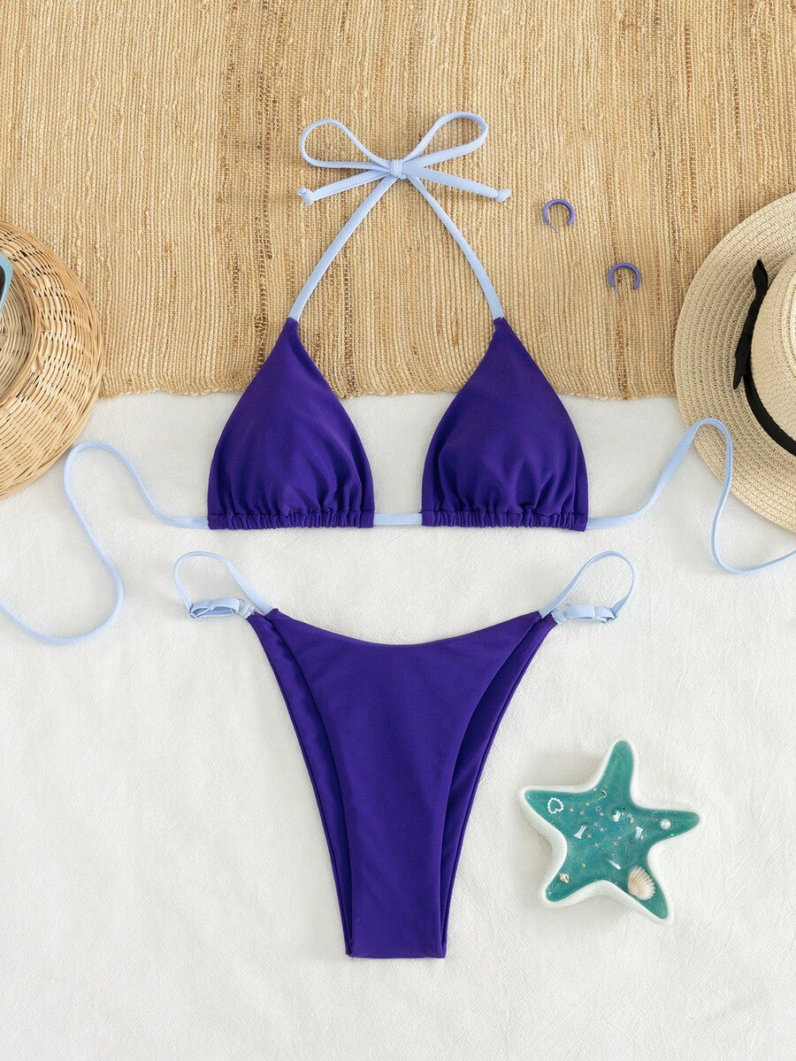 Women's printed halter neck tie two-piece swimwear featuring a wireless triangle top with removable padding and high-waist high-cut bikini bottoms.