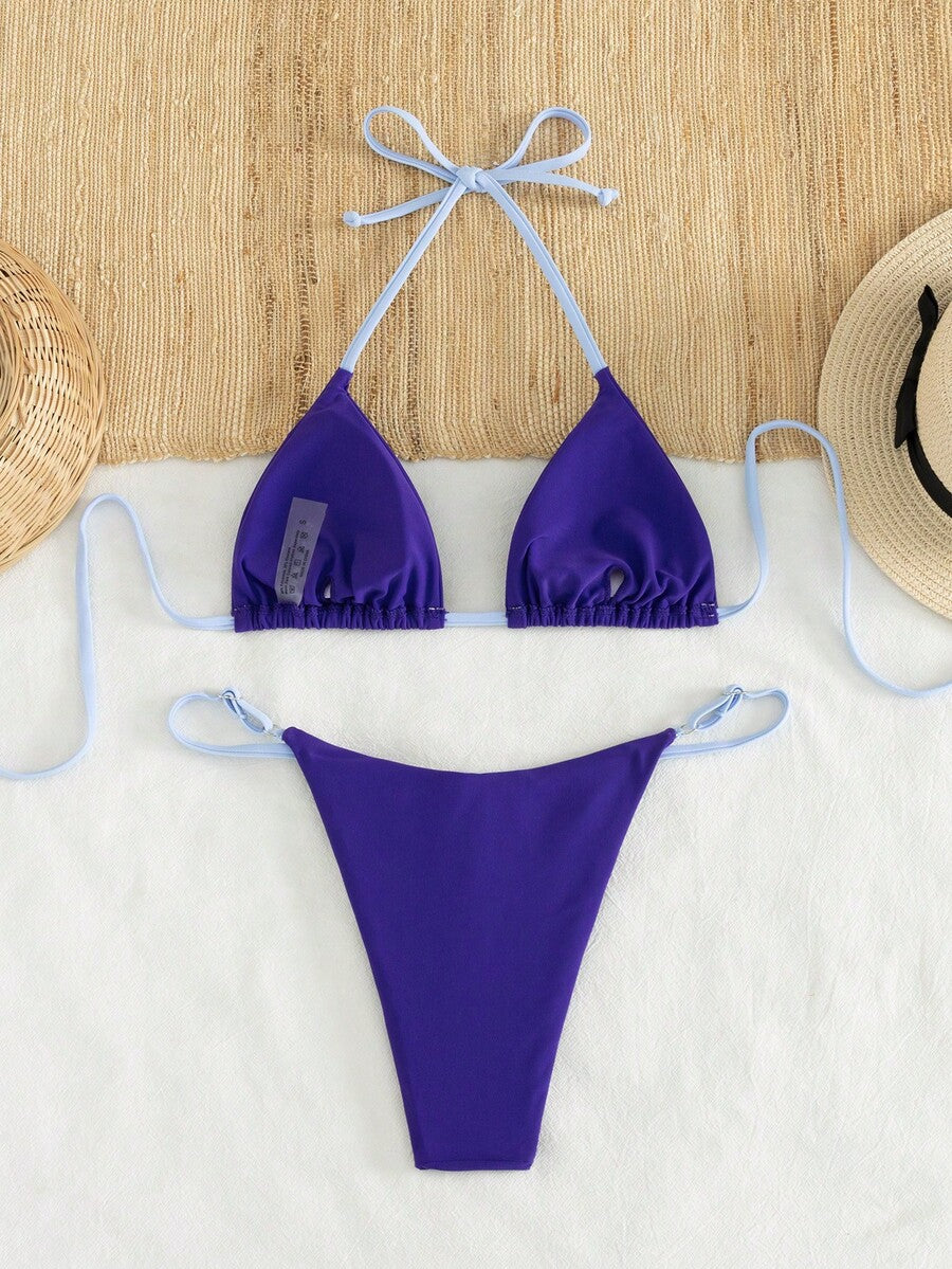 Women's printed halter neck tie two-piece swimwear featuring a wireless triangle top with removable padding and high-waist high-cut bikini bottoms.
