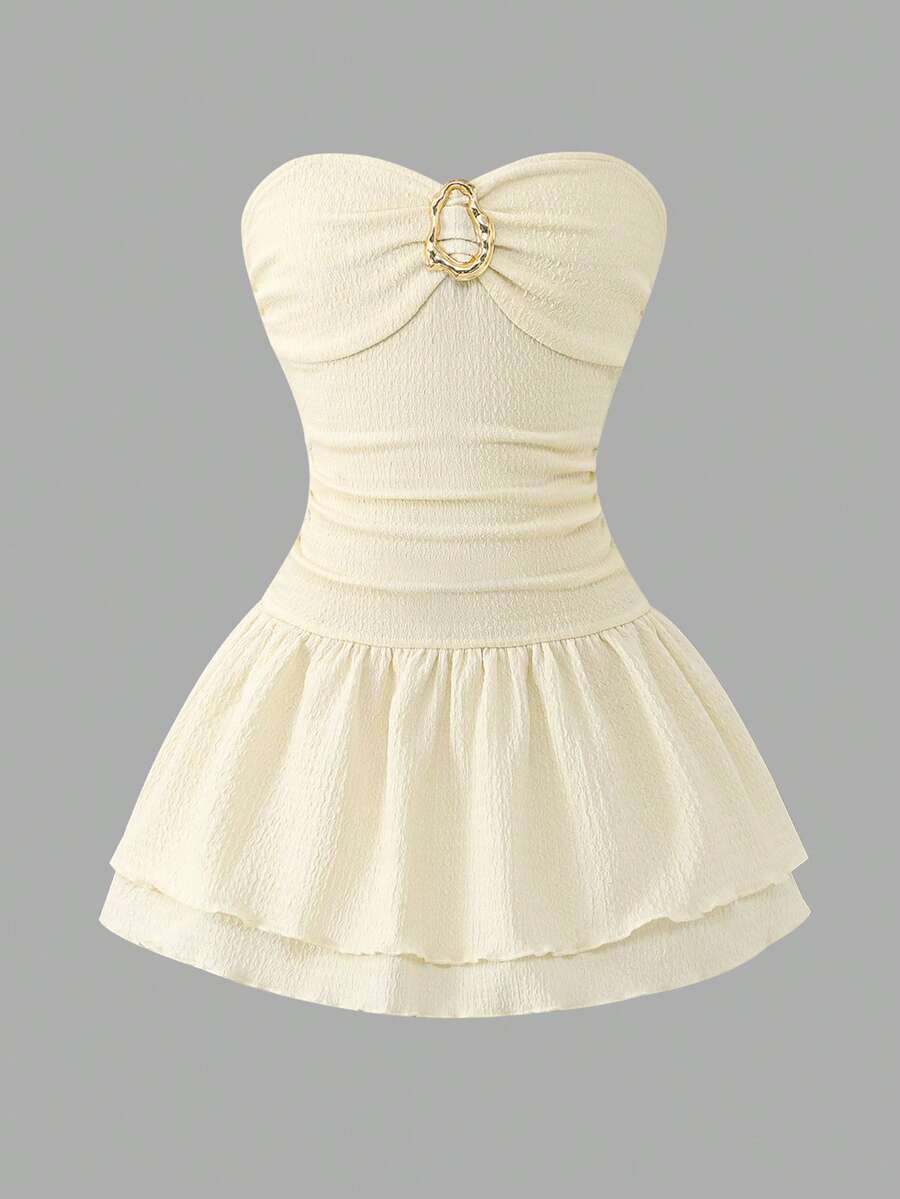 Tween girls apricot sleeveless halter mini dress with textured starfish and shell decor, shirred tiered layer, high waist, and flounce hem.
