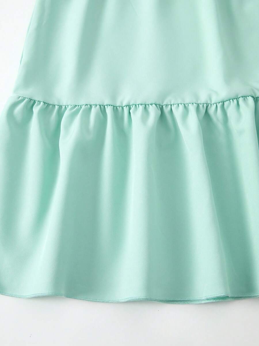 Tween girl blue plant print spaghetti strap cami dress with shirred high waist and flounce ruffled hem