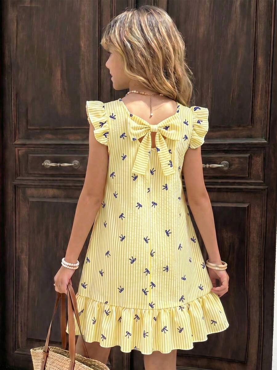 Tween girls apricot vacation midi dress featuring a round neck, cut out details, ruffle flounce accents, and geometric pattern.