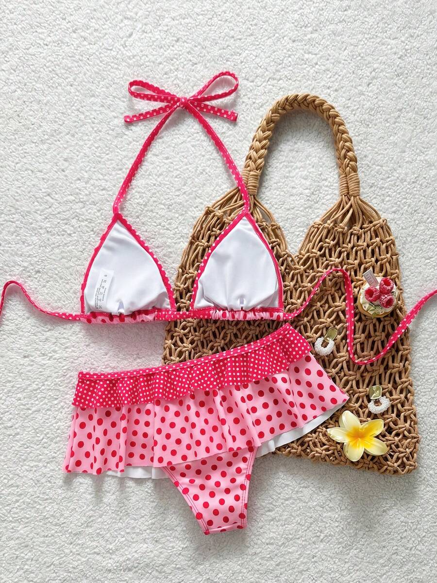 Women's ruffled halter two-piece bikini set with low waist bottoms and wireless triangle cups.