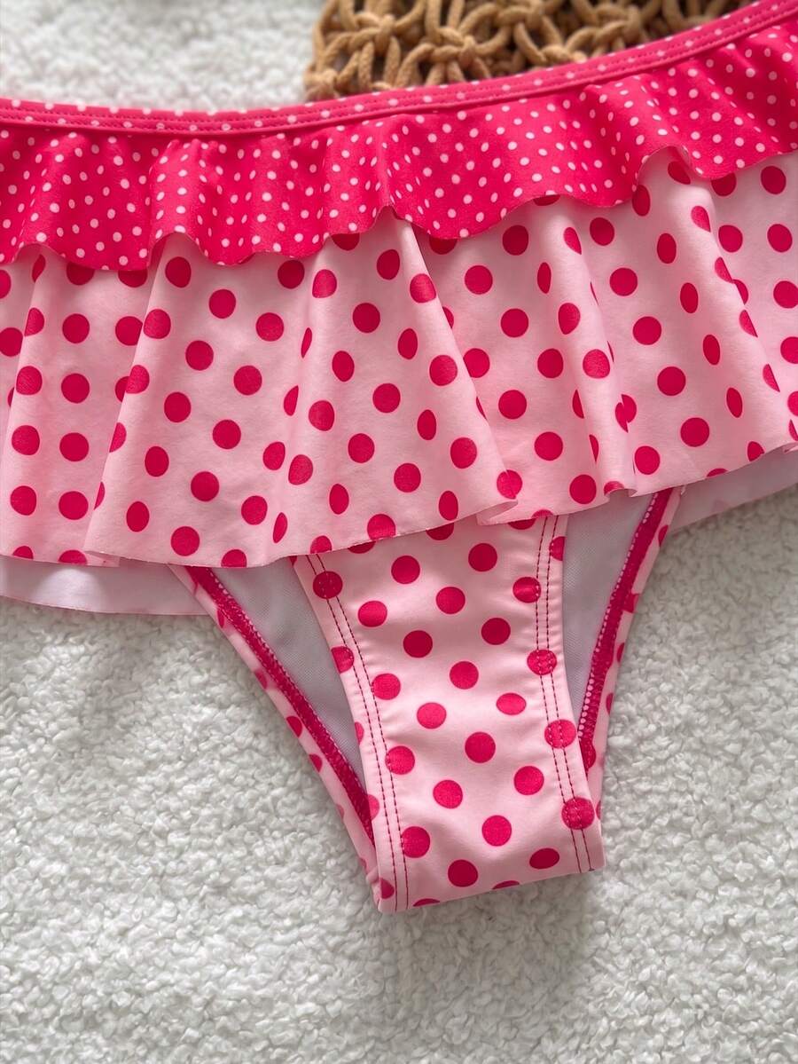 Women's ruffled halter two-piece bikini set with low waist bottoms and wireless triangle cups.