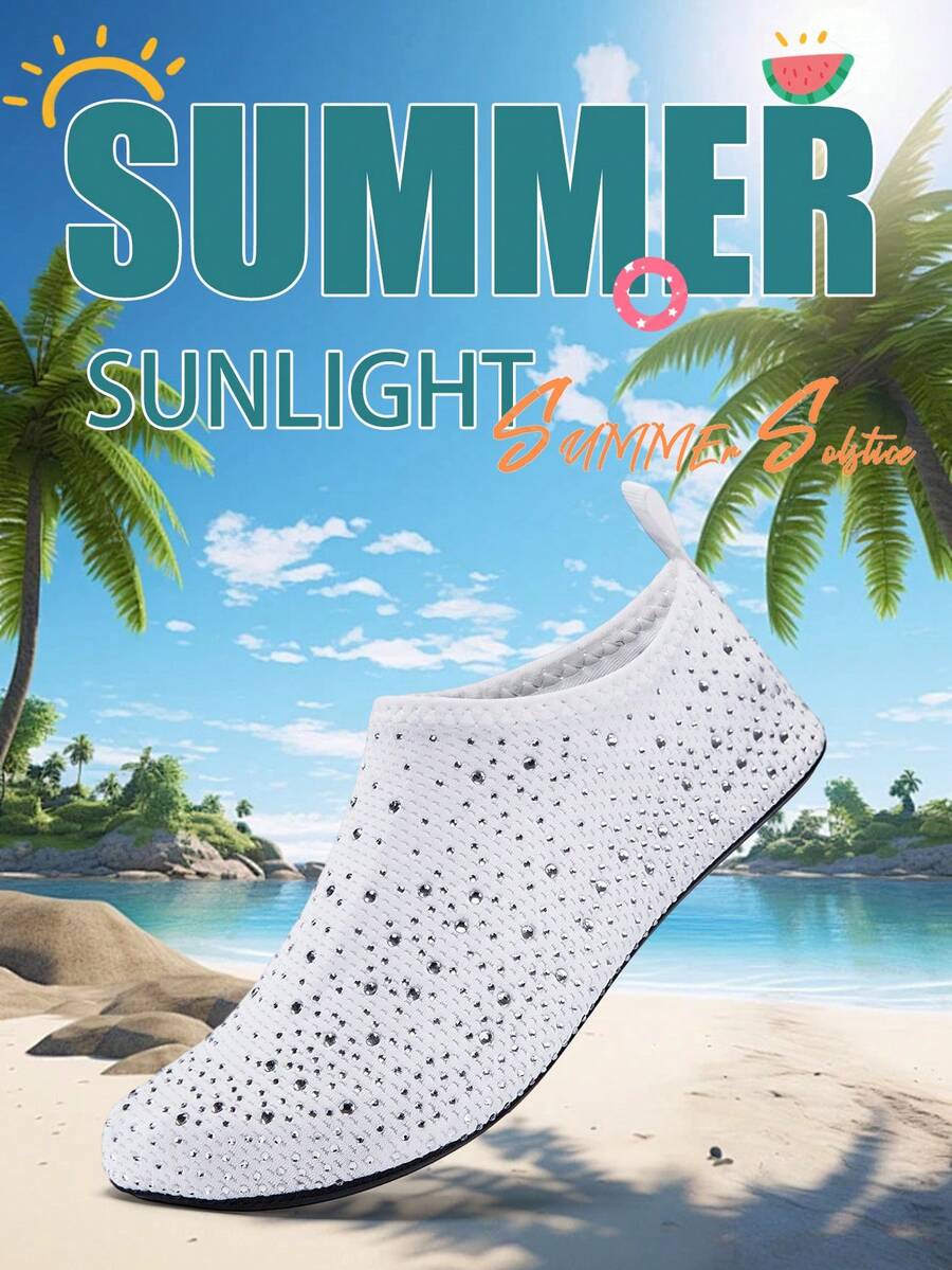 White children's slip-on water shoes with breathable mesh upper, soft EVA insole, non-slip TPR outsole, and rhinestone accent.