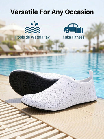 White children's slip-on water shoes with breathable mesh upper, soft EVA insole, non-slip TPR outsole, and rhinestone accent.