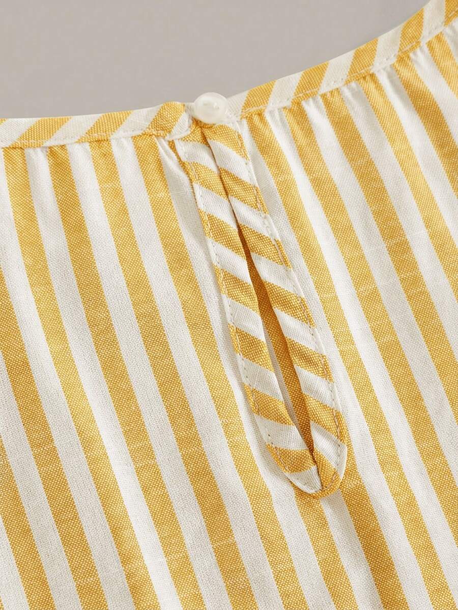 Tween girls casual apricot striped sleeveless top with round neck and ruffle hem paired with matching straight leg pants.