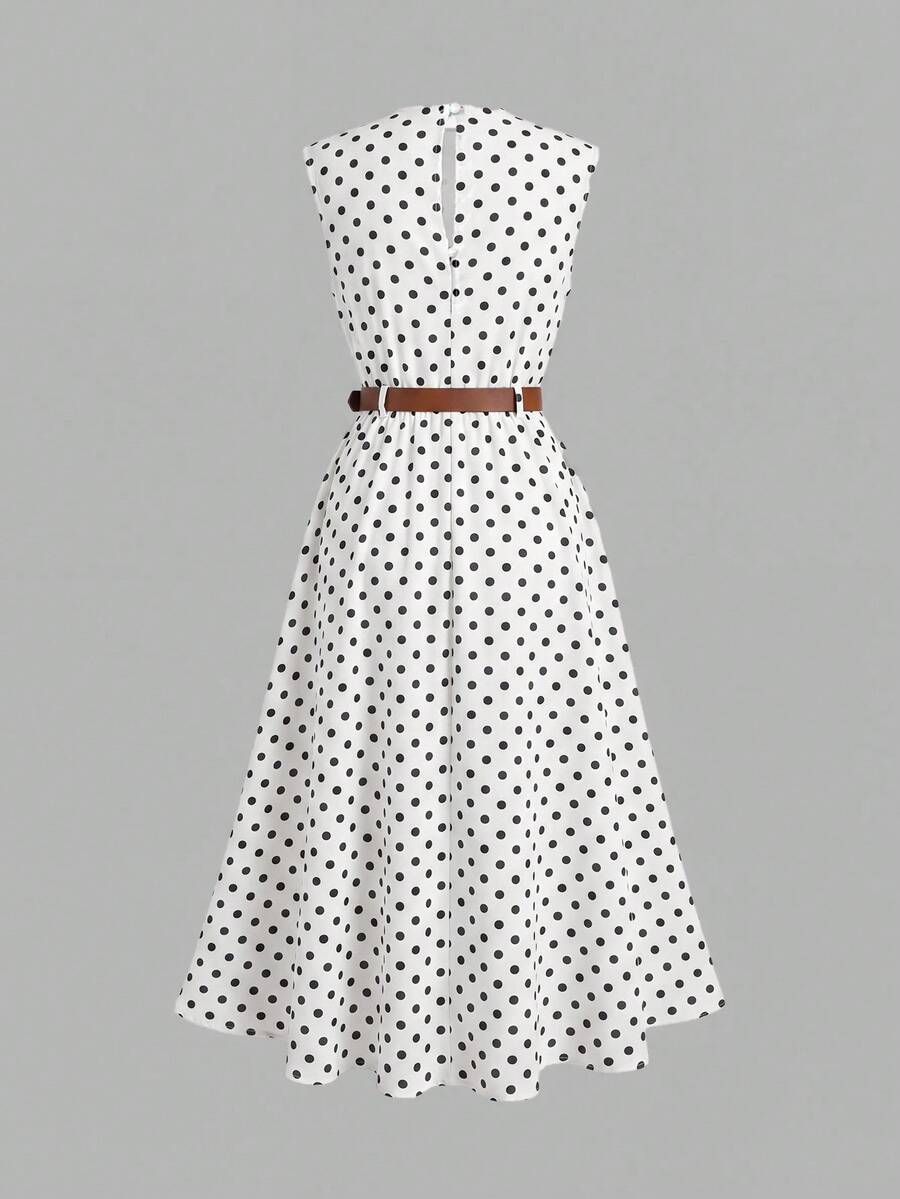 Tween girl wearing an apricot plant print long dress featuring a stand collar, short sleeves, high waist, flared hem, and back zipper closure.
