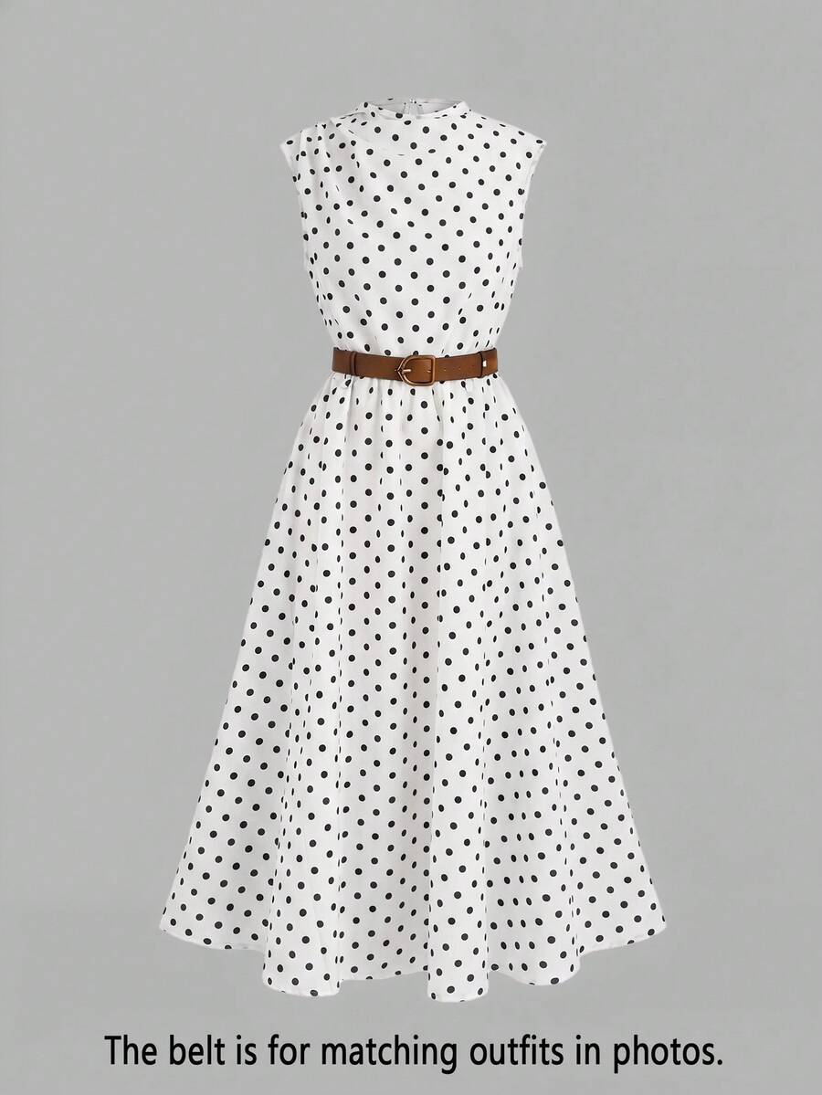 Tween girl wearing an apricot plant print long dress featuring a stand collar, short sleeves, high waist, flared hem, and back zipper closure.