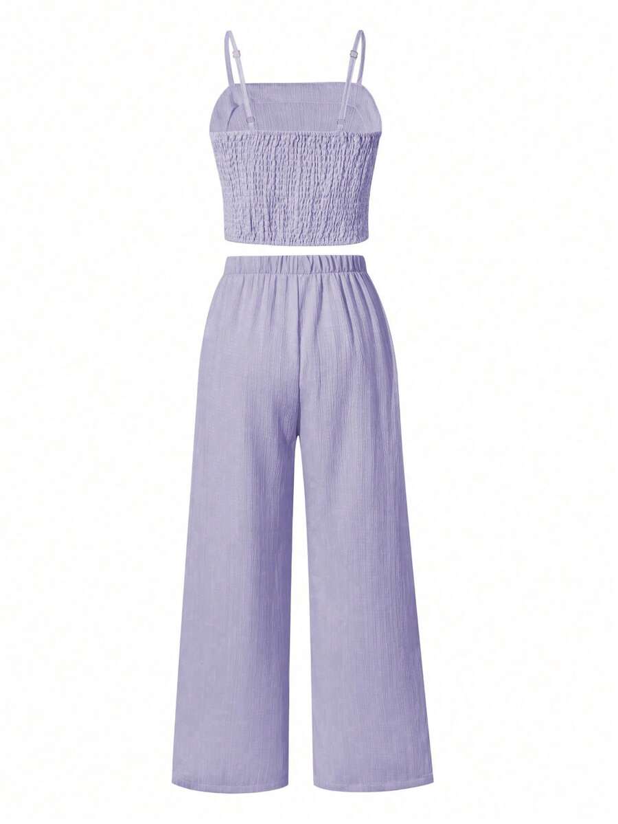 Tween girls casual 2-piece set featuring an apricot woven camisole crop top with back shirring and matching high-waisted loose long pants.