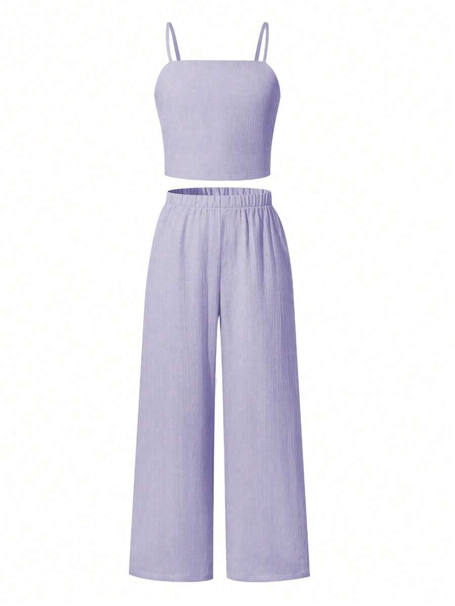 Tween girls casual 2-piece set featuring an apricot woven camisole crop top with back shirring and matching high-waisted loose long pants.