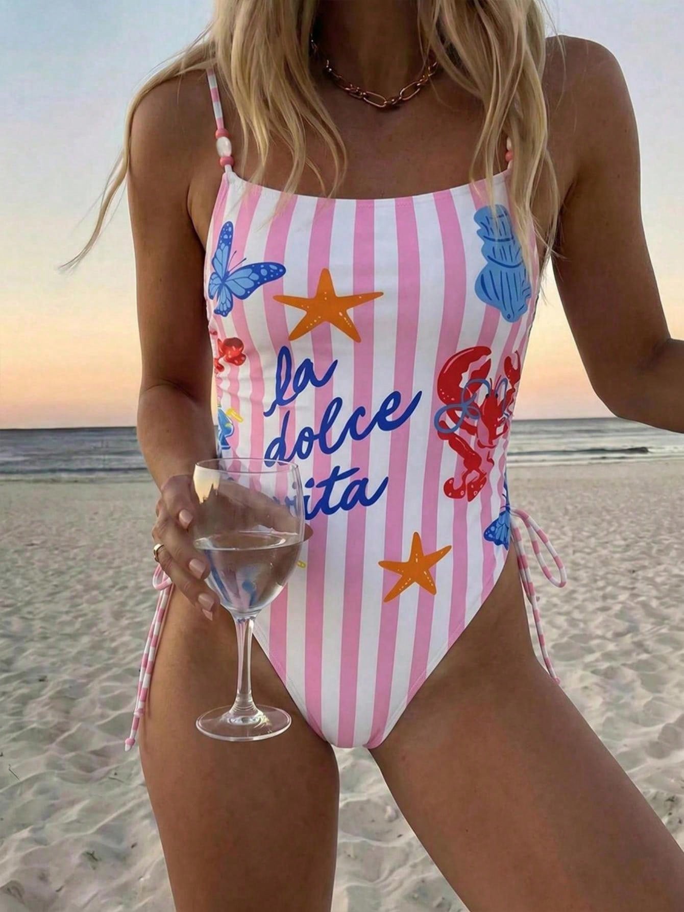 Women's blue backless one-piece swimsuit featuring spaghetti straps, wireless bra with removable padding, and drawstring details.