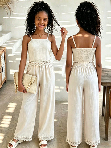 Tween girls casual 2-piece set featuring an apricot woven camisole crop top with back shirring and matching high-waisted loose long pants.