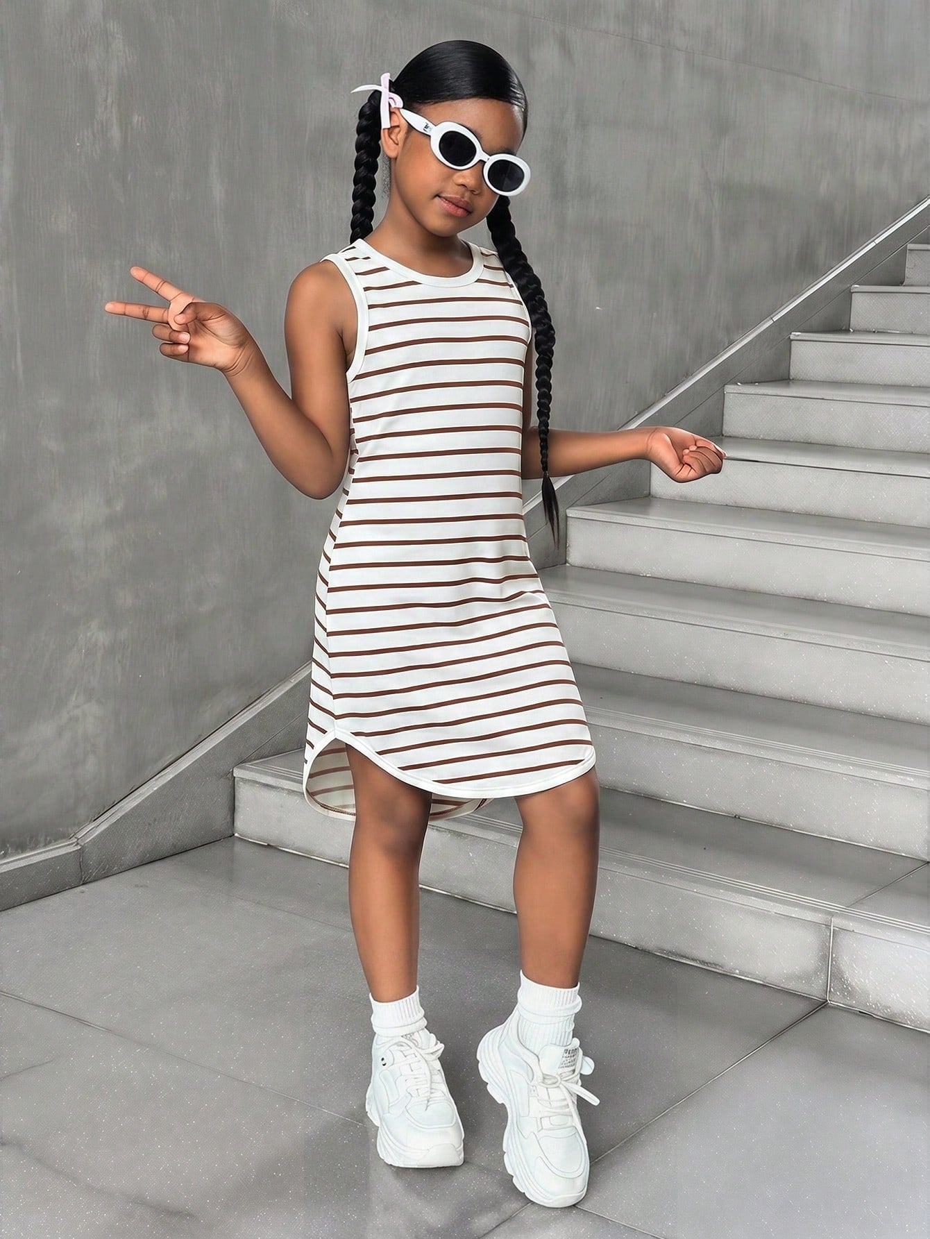 Tween girls sleeveless tie-dye tank dress with round neck, loose fit, short length, and asymmetrical hem in a casual streetwear style