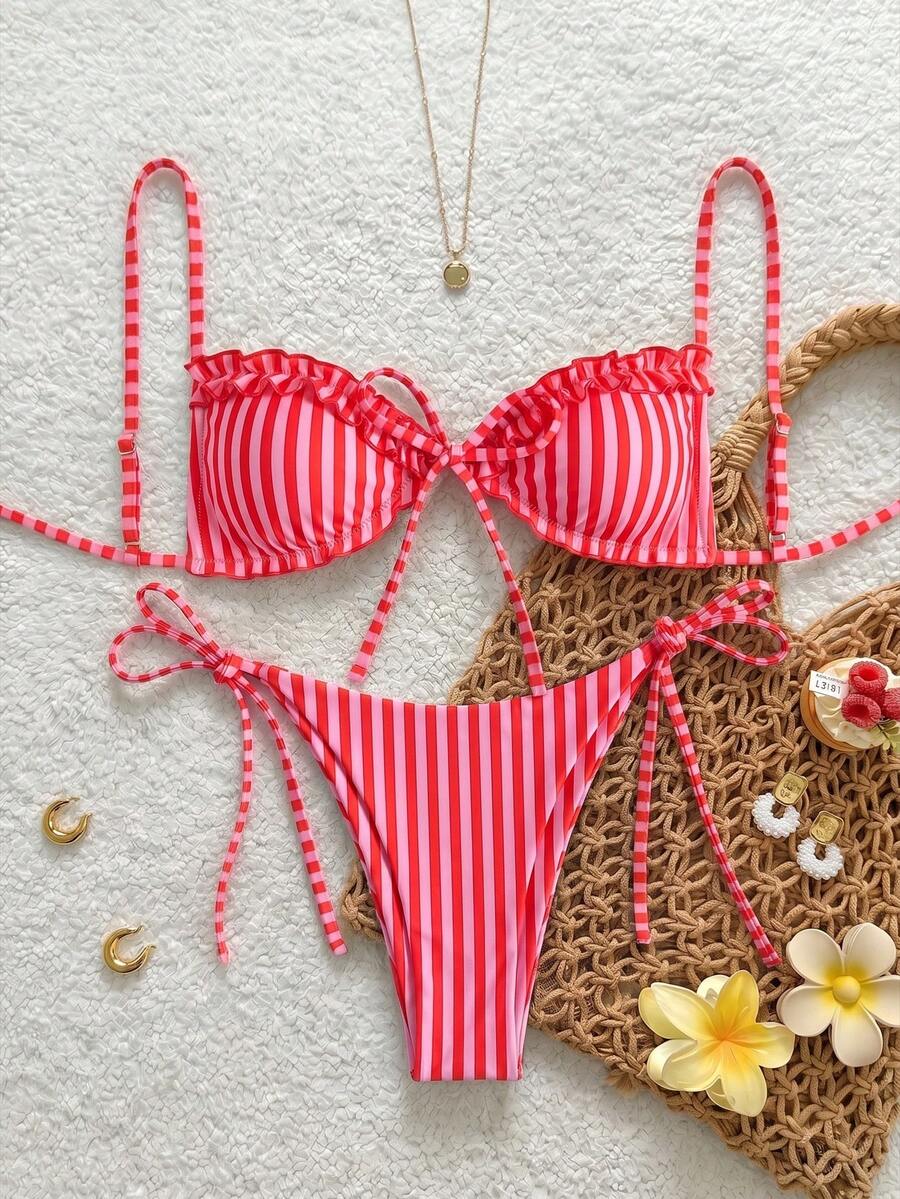 Women's beige two-piece bikini set featuring a wireless top with removable padding, spaghetti straps, tie back detail, and low waist hipster swimsuit bottoms.
