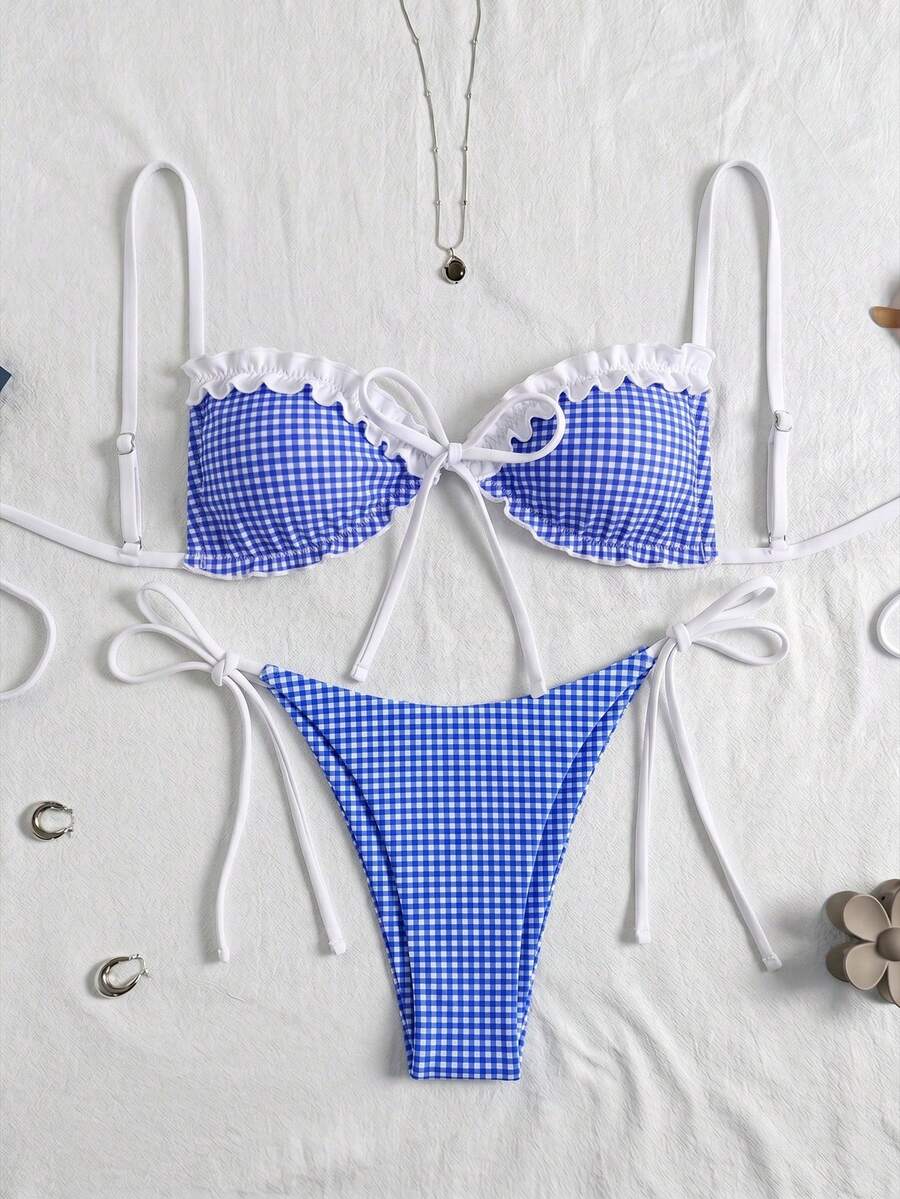 Women's beige two-piece bikini set featuring a wireless top with removable padding, spaghetti straps, tie back detail, and low waist hipster swimsuit bottoms.