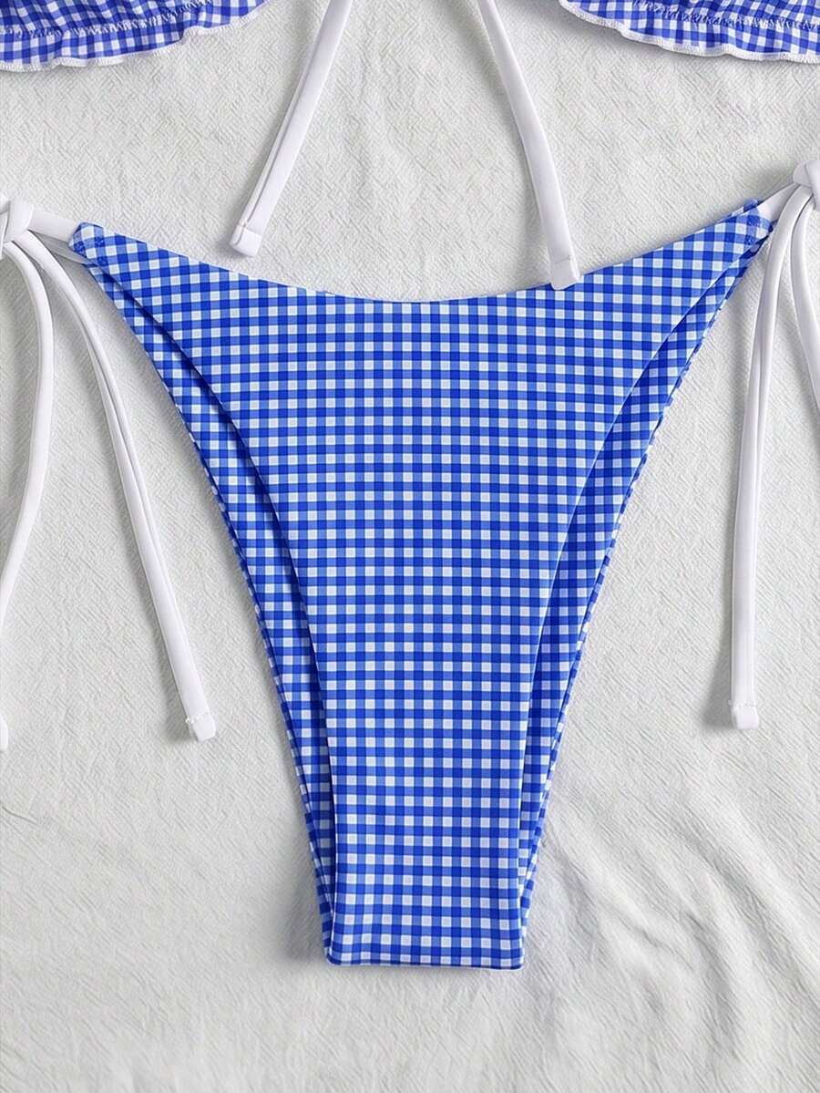 Women's beige two-piece bikini set featuring a wireless top with removable padding, spaghetti straps, tie back detail, and low waist hipster swimsuit bottoms.