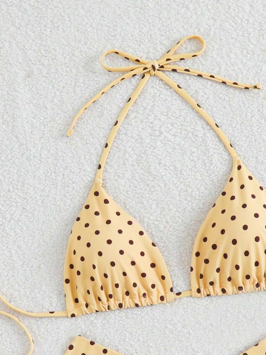 Polka dot halter bikini set for women featuring a back-tie triangle top with removable padding and high-waist high-cut bikini bottoms.