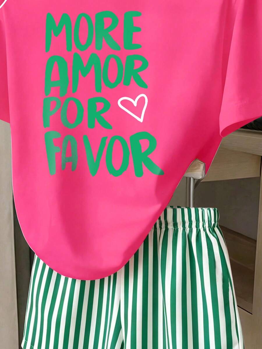 Girls' multicolor short sleeve T-shirt and shorts set featuring a cute cherry and bow print with round neck top and matching shorts.