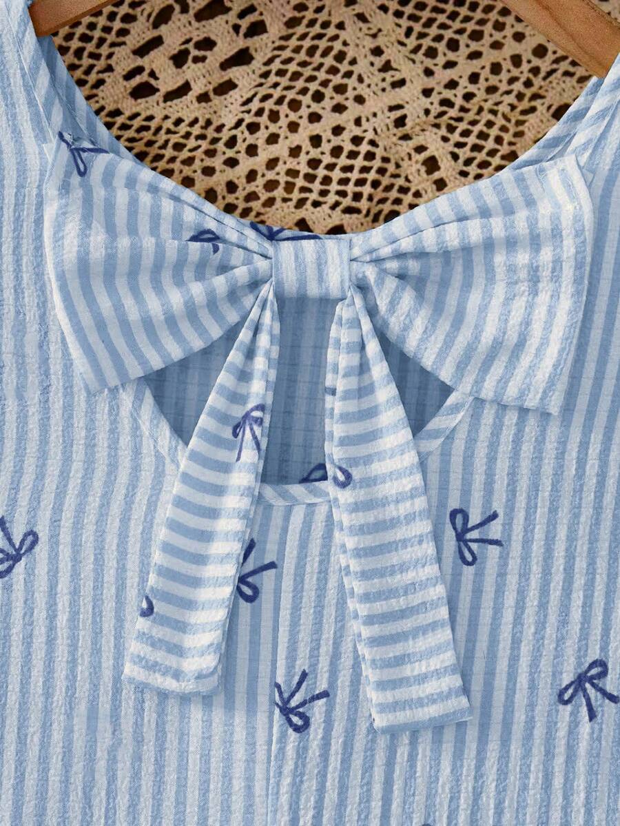 Tween girls apricot vacation midi dress featuring a round neck, cut out details, ruffle flounce accents, and geometric pattern.