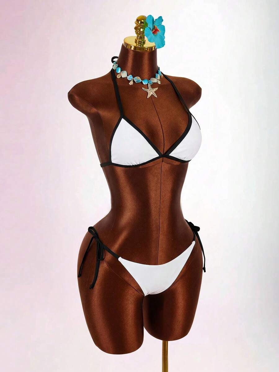 Blue 3-piece women's swimwear set featuring a 3D rose detailed triangle top with cutout tie closure and matching tie-side thong bottom.