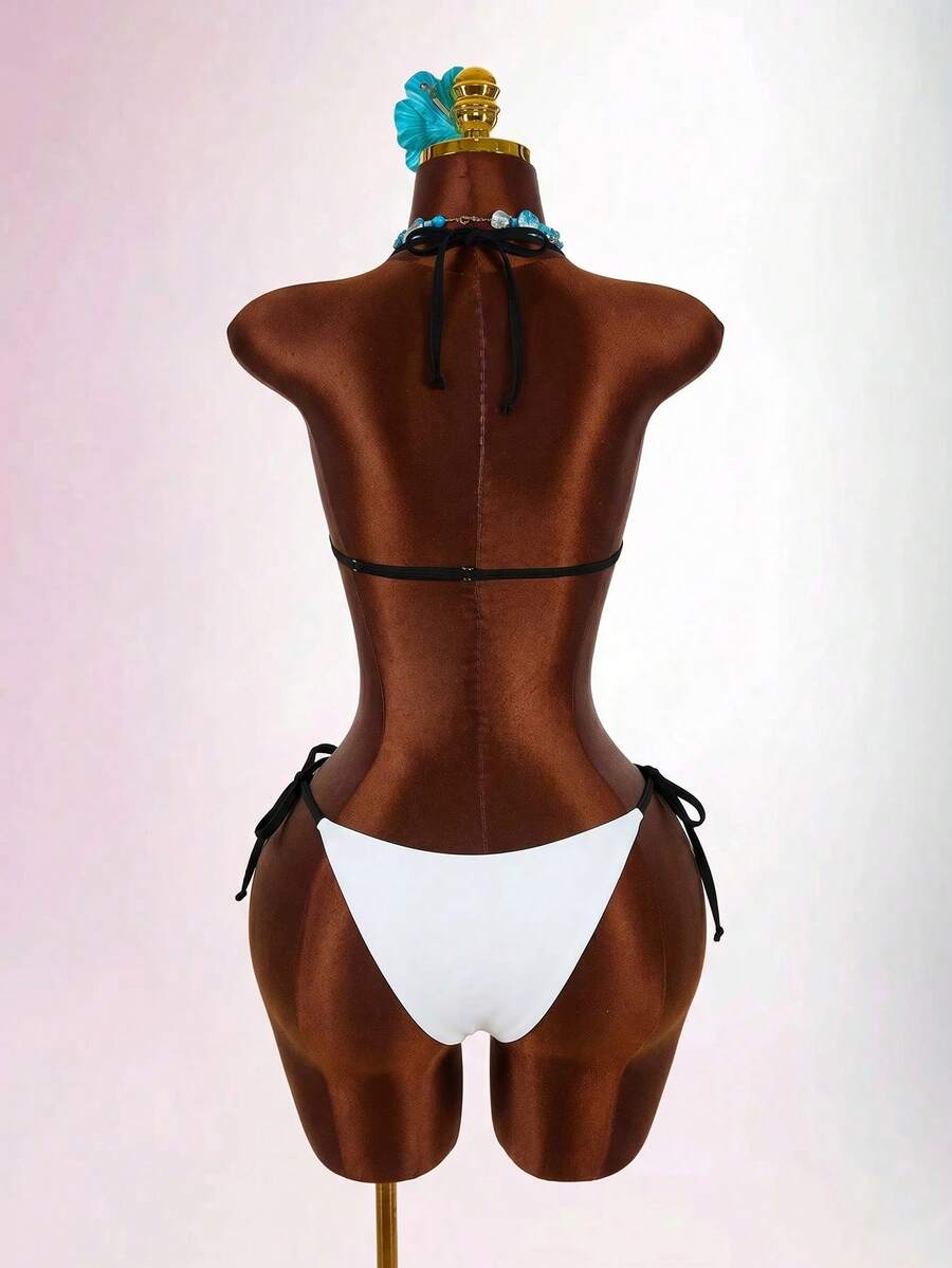 Blue 3-piece women's swimwear set featuring a 3D rose detailed triangle top with cutout tie closure and matching tie-side thong bottom.