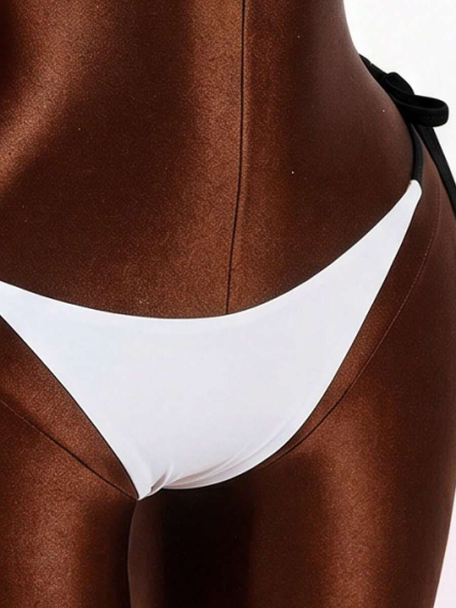 Blue 3-piece women's swimwear set featuring a 3D rose detailed triangle top with cutout tie closure and matching tie-side thong bottom.