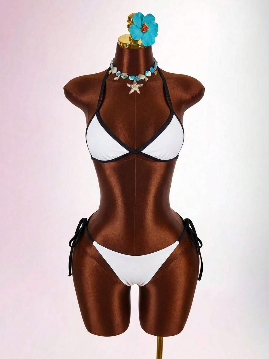 Blue 3-piece women's swimwear set featuring a 3D rose detailed triangle top with cutout tie closure and matching tie-side thong bottom.